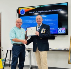 Compatriot Oscar Westerfield (left) receiving Minuteman Certificate from Robbie Robinson (right) at Tampa SAR Chapter meeting