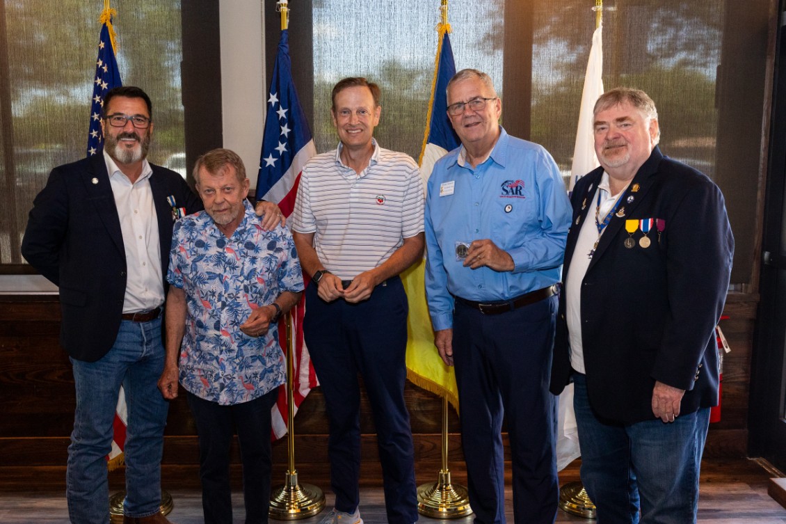 Presentation of FAAM 250 Challenge coins to Jim McHugh, Scott Moore, Tom Carpenter, by Chuck Adams(Right) and FAAM Chair(Left). Photos taken by Al Evans, FTLSAR compatriot