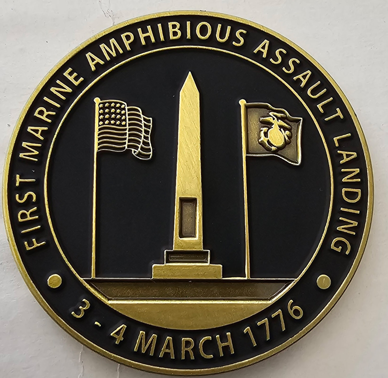 Front view of First Marine Amphibious Assault Memorial Challenge Coin